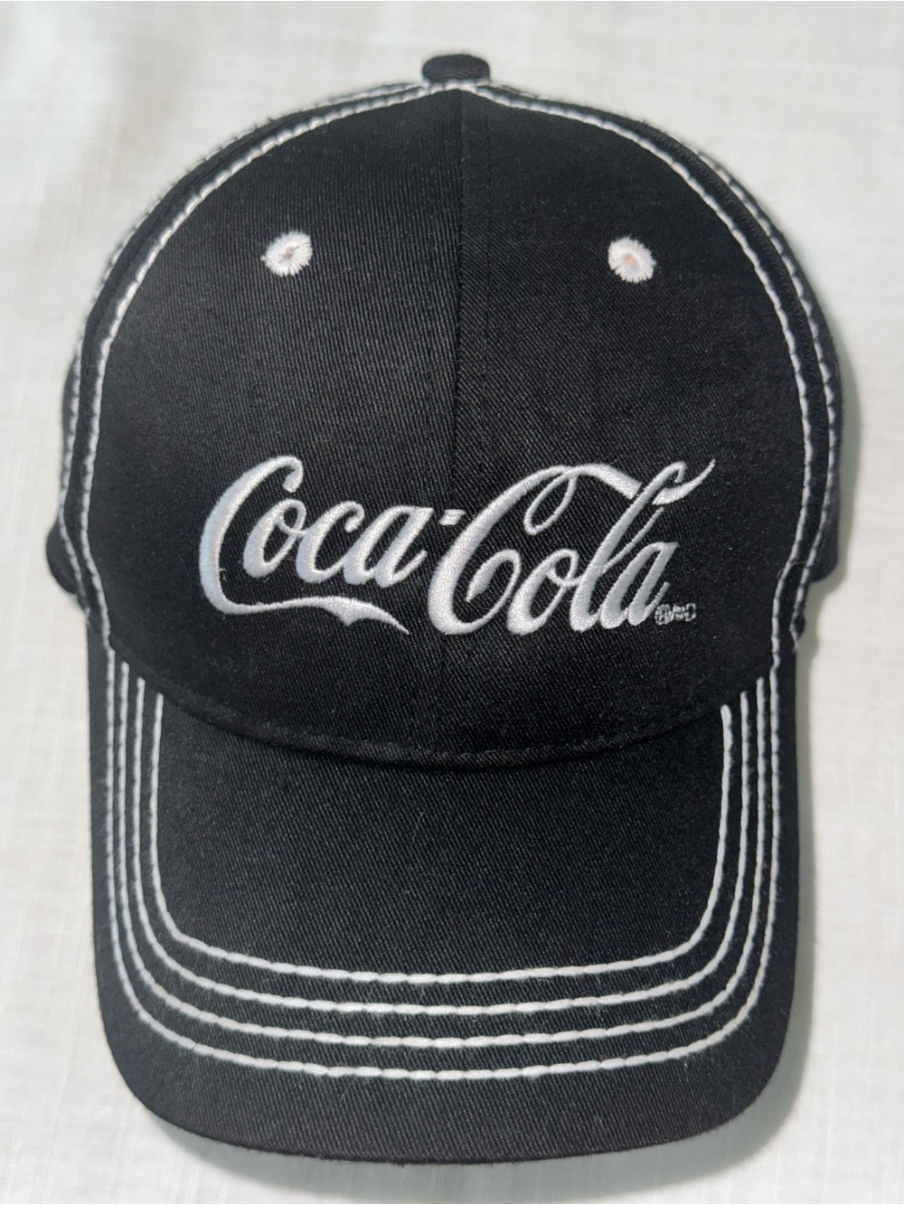 Coca-Cola “Live Positively” Recycled 2.5 Bottle cap with vintage white stitching
